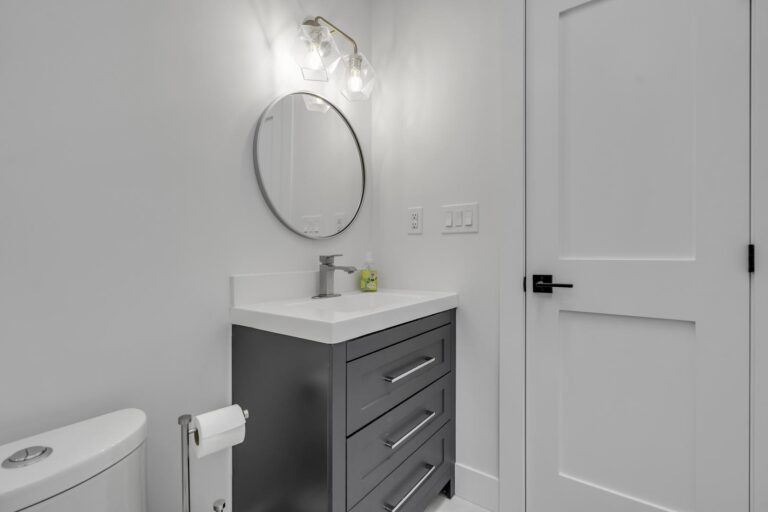 single bathroom vanity with a mirror