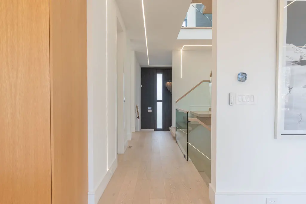Natural wood covered corridor in the newly redesigned home